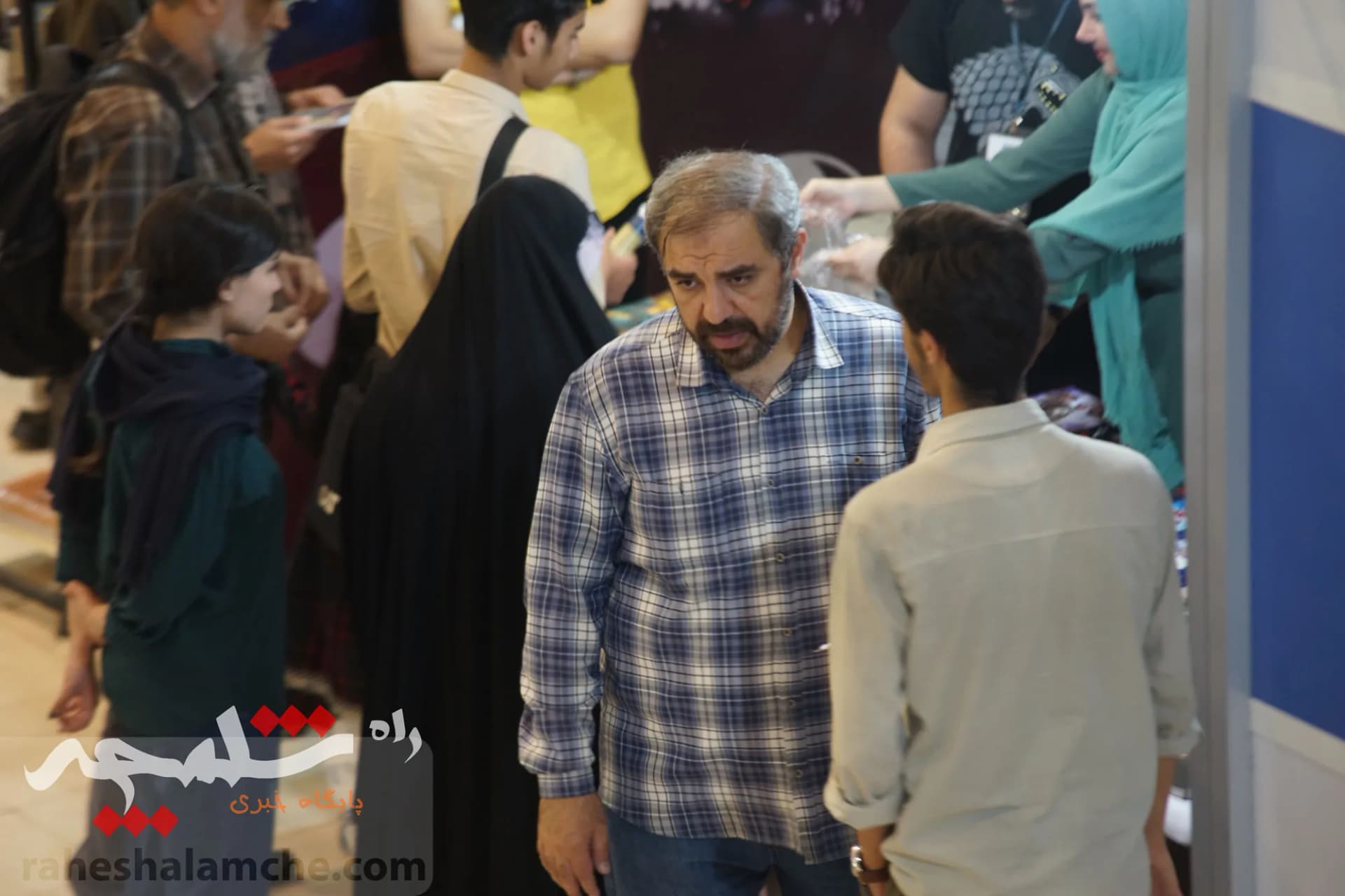 دومین روز نمایشگاه بین‌المللی کتاب برگزار شد +تصاویر — تصویر 11