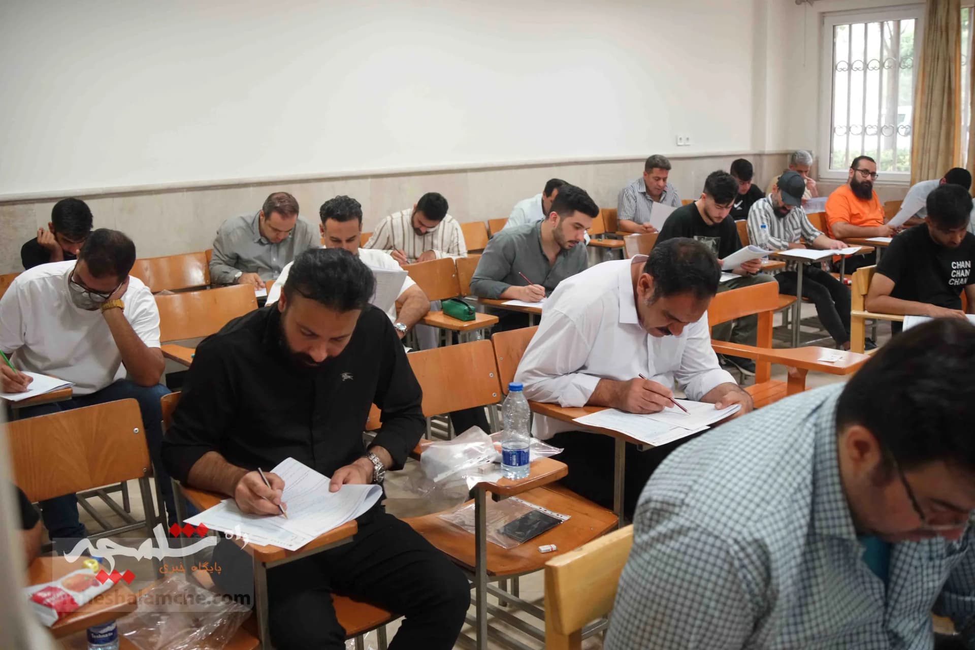آزمون استخدامی فرزندان شهدا و جانبازان +تصاویر — تصویر 19