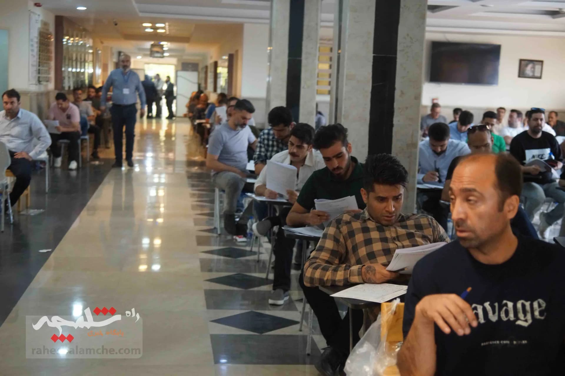 آزمون استخدامی فرزندان شهدا و جانبازان +تصاویر — تصویر 21