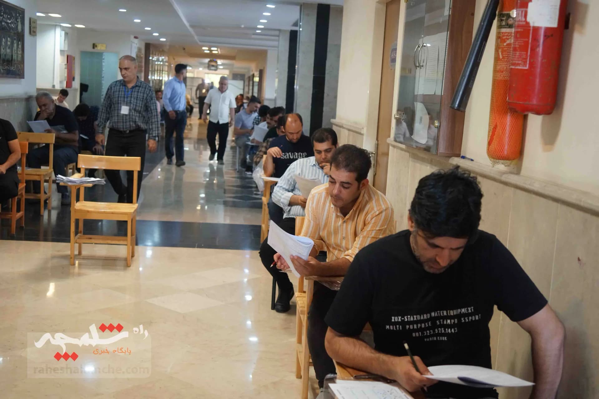آزمون استخدامی فرزندان شهدا و جانبازان +تصاویر — تصویر 20