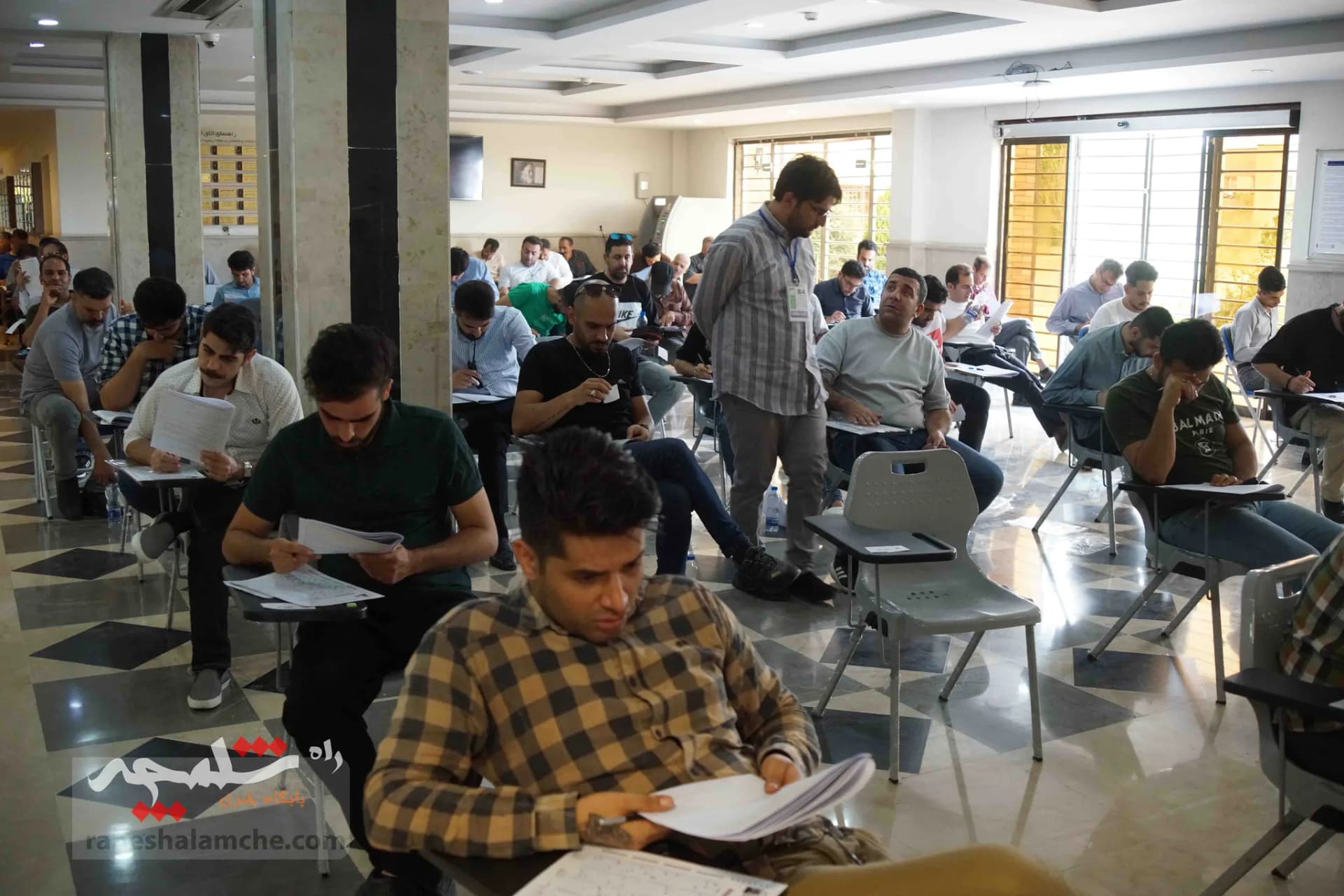 آزمون استخدامی فرزندان شهدا و جانبازان +تصاویر — تصویر 15